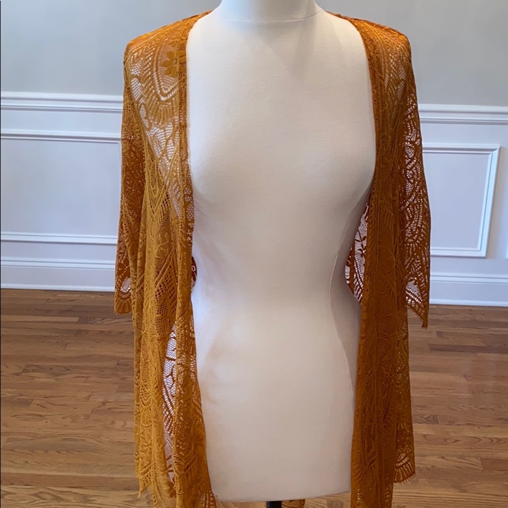 5$ PUMPKIN COLORED SHRUG